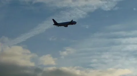 Jet flight into sun Stock Footage 45876521