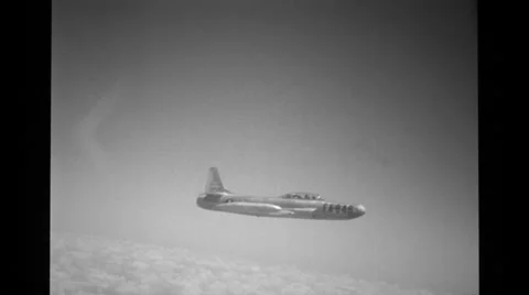 Jet flying high up in the sky Stock Footage 36424800