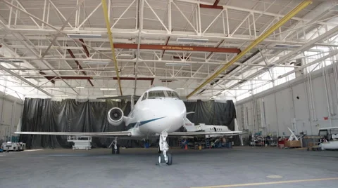 Jet in Hangar (Front Wide) HD Vídeos de archivo 61244037
