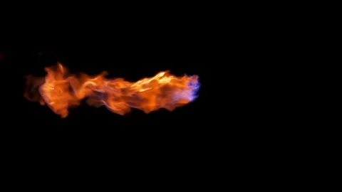 Jet of hot flame great for lower thirds and motion graphics isolated on black Stock Footage 77134395