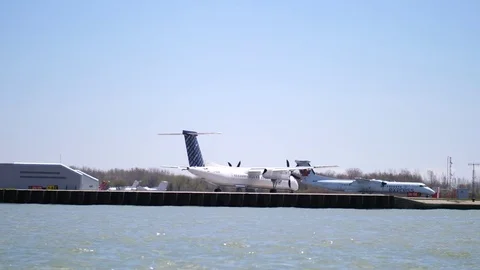 Jet Passenger Planes taking off on a runway 스톡 동영상 76221091