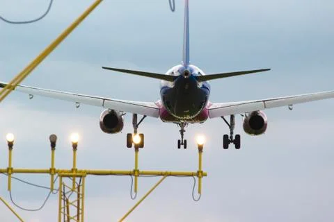 Jet plain landing from behind Stock Photos