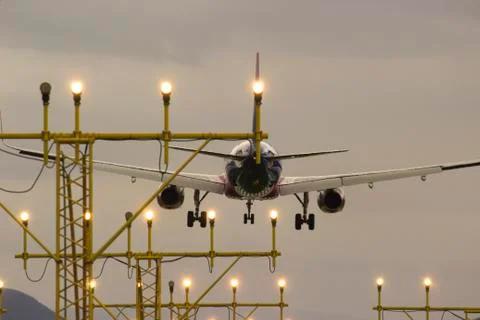 Jet plain landing from behind Stock Photos