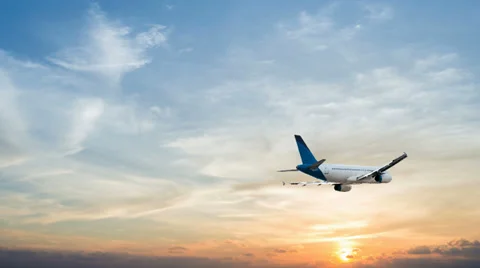 Jet plane is cruising in a sunset sky Stock-Footage 34932017