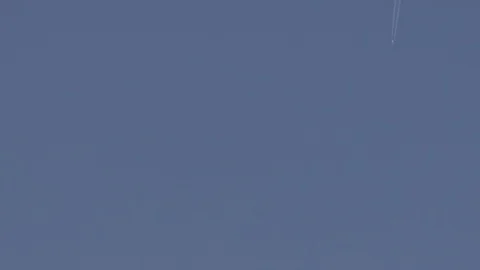 Jet Plane Flying In The Sunset Sky Stock-Footage 104097424