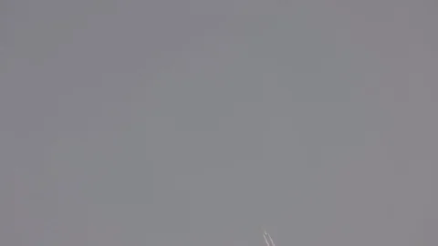 Jet Plane Flying In The Sunset Sky 스톡 동영상 104099775
