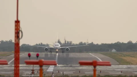Jet plane front view on runway Stock Footage 329256021