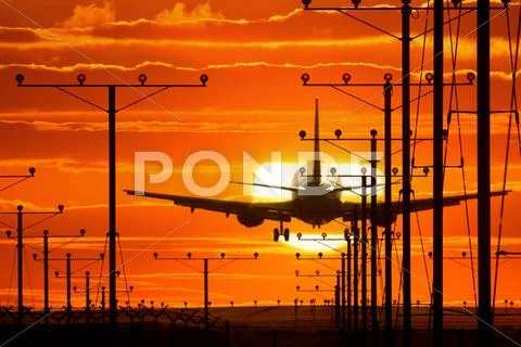 Jet plane landing Stock Photos