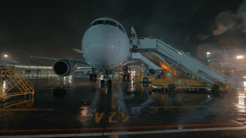 Jet plane parked with stairs deployed Stock-Footage 99265137
