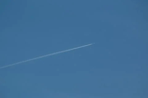 A jet plane in the sky Stock Photos