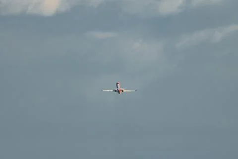 Jet plane taking off isolated in the sky Stock Photos
