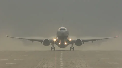 Jet plane taking off on a misty morning Stock Footage 30047516