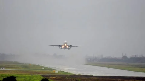 Jet plane taking off at wet rain runaway Stock Footage 42893515