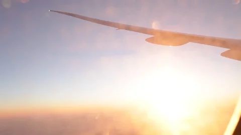 Jet porthole view. Sunset. Clouds 20160127143724 680 2 Stock Footage 129208848