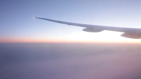 Jet porthole view. Sunset. Clouds 20160127143516 676 3 Stock-Footage 129208885