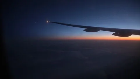Jet porthole view. Sunset. Clouds 20160127143440 674 1 Stock-Footage 129208920