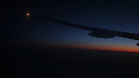 Jet porthole view. Sunset. Clouds 20160127143350 672 Stock Footage 129208930