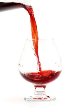 A jet of red wine Stock Photos