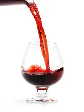 A jet of red wine Stock Photos