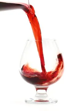 A jet of red wine Stock Photos