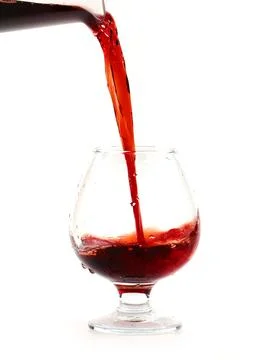 Jet of red wine Stock Photos