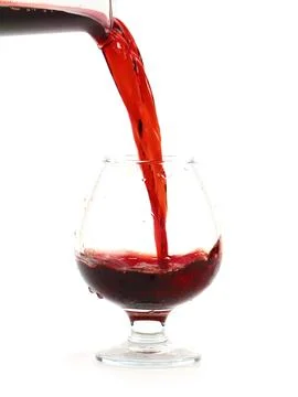 Jet of red wine Stock Photos