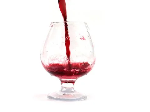 A jet of red wine Stock Photos