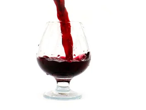 A jet of red wine Stock Photos