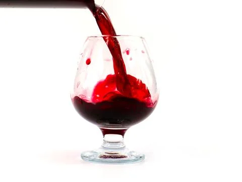 A jet of red wine Stock Photos