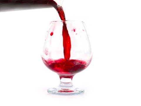 A jet of red wine Stock Photos