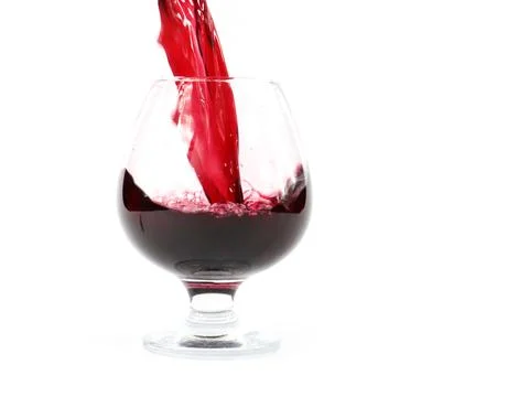 A jet of red wine Stock Photos