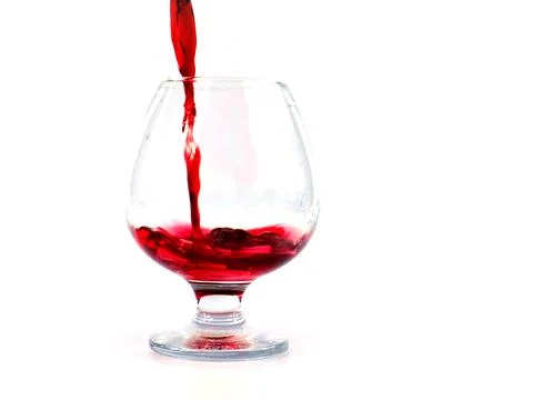 A jet of red wine Stock Photos