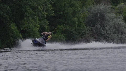 Jet ski 360 spin splash slow motion Stock Footage 249789779