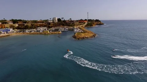 Jet ski Cabo Roig beach Spain Orihuela Costa aerial view Stock Footage 129511205