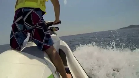 Jet ski driver standing back view Stock-Footage 98248187