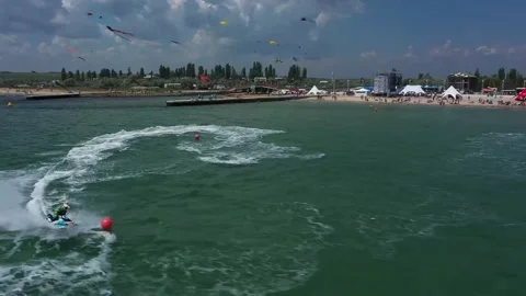 The jet ski drives around the buoys at high speed Stock Footage