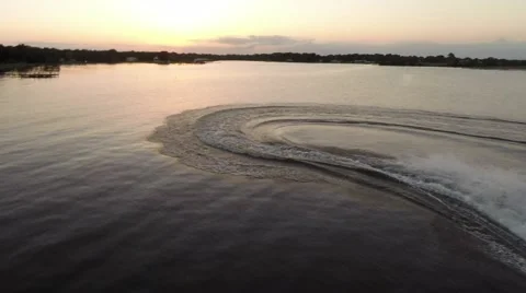 Jet ski in front of a great sunset Stockbeeldmateriaal 50447145