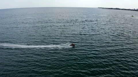 Jet ski at high speed cuts the water surface Stock Footage 146230980