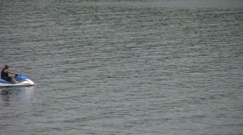 Jet ski idling across screen Video stock 488120