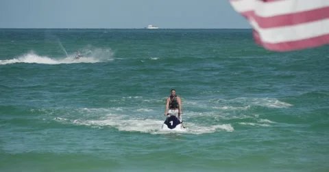 Jet Ski Ocean with American Flag Stock Footage 60982061