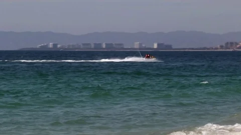 Jet ski in the ocean, city Stock Footage 78111495