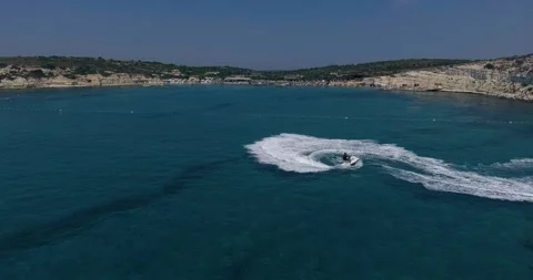 Jet ski in open waters - Aerial footage Stock Footage 219612963
