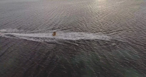 Jet ski pulling airhead tube Stock Footage 85774268