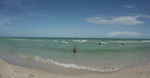 Jet Ski pulling up to Beach / Miami 4K Stock Footage 60648664