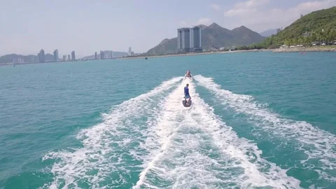 Jet Ski pulls SUP Stock Footage 290863256