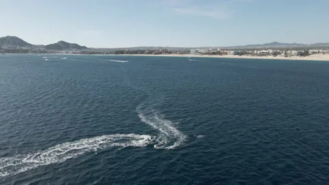 Jet ski riders enjoyed on the Pacific Ocean coast in Mexico Stock Footage 157825384
