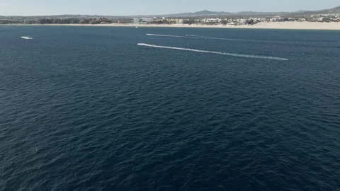 Jet ski riders enjoyed on the Pacific Ocean coast in Mexico Stock Footage 157825452