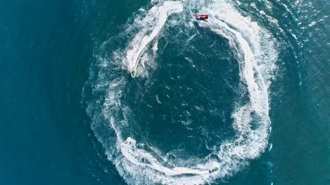Jet ski rides a circle Stock Footage 125412811