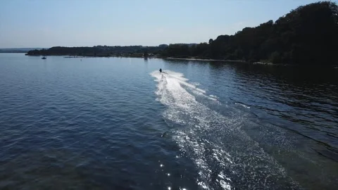 The jet ski rides on the lake. Drone footage. Water transportation. Stock Footage 295069702