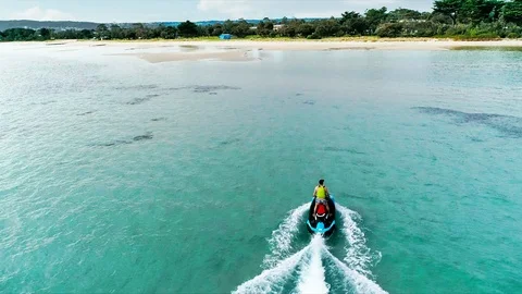 Jet Ski Riding Into Beach Stock Footage 124293414